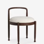 sheesham wood stool with curved back rail cream bouclé seat rustic woods