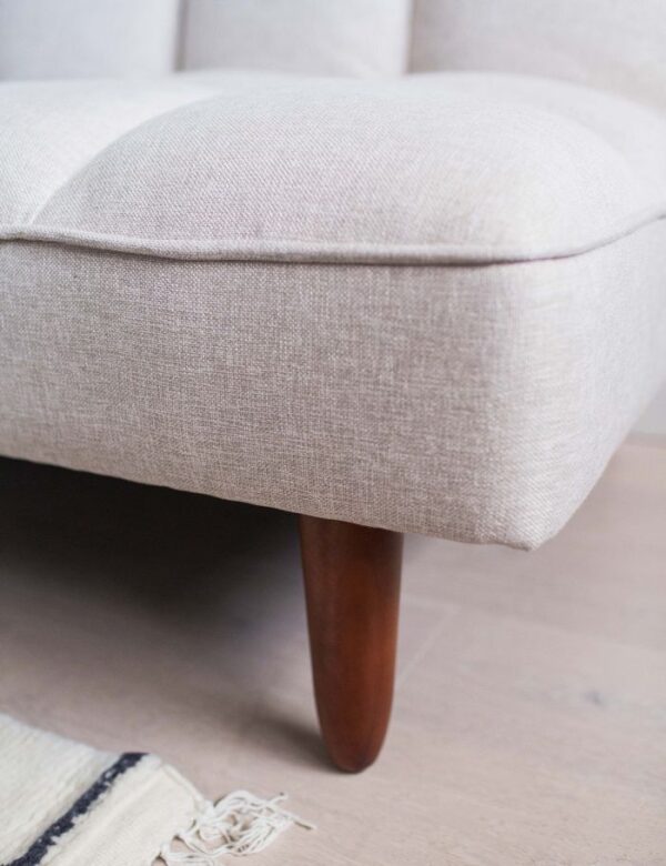 solid wood sofa cum bed front view tufted cushions rustic woods