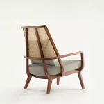 sheesham wood lounge chair hand woven cane back detail rustic woods jodhpur